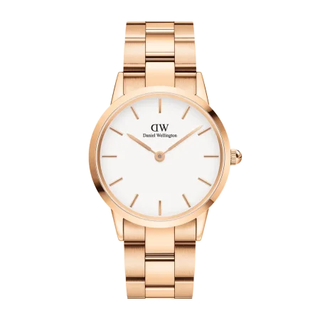 Daniel Wellington watch featuring a round shape, a pink strap, and a white dial.